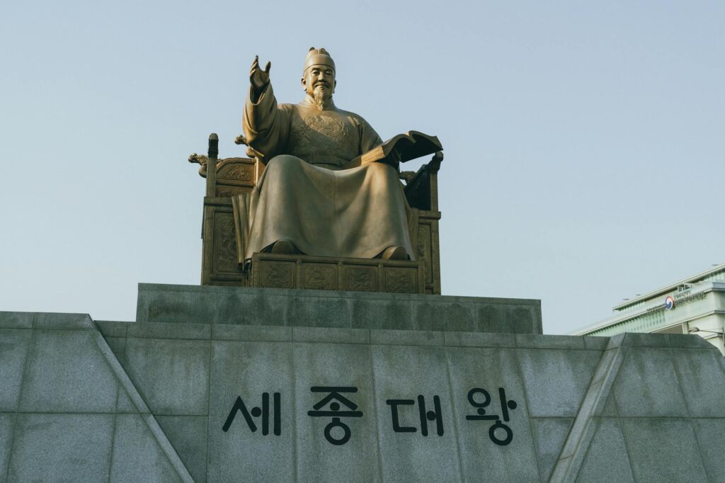 Statue of King Sejong at Gwanghwamun Square, Seoul, representing Korean heritage and history.